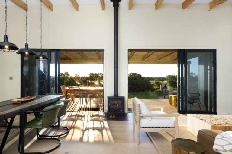 Lounge and dining room of the Caracal House at the Rooikat safari Collection